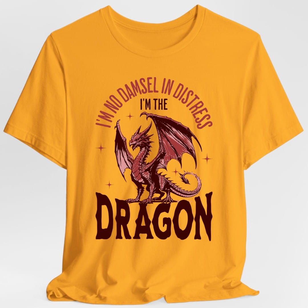 The same No Damsel In Distress dragon design, on a gold t-shirt.
