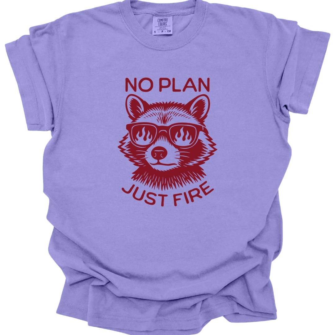 The same No Plan Just Fire raccoon design, on a violet t-shirt.
