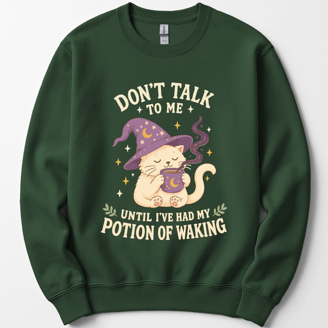 The same Potion Of Waking cat design, on a forest green sweatshirt.