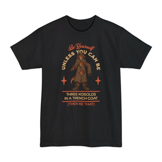 Black tall t-shirt. The design reads "Be yourself" in script at the top, then "unless you can be" curving around the picture, then "Three kobolds in a trench coat" on two lines below, then "(then be that)" at the bottom. In the middle, three small red kobolds are stacked inside one long tan trench coat and a fedora, the top one grinning out from under the hat brim and the other two peering through gaps between the buttons, with a tail poking out of the hem. Bold cartoon art in tan, rust and dark red.
