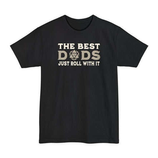 Black tall t-shirt. Reads "The best" across the top in cream capitals, then "Dads" in large letters where the middle letter is replaced by a twenty-sided die showing 20. Across the bottom, "Just roll with it". All type in cream and tan.