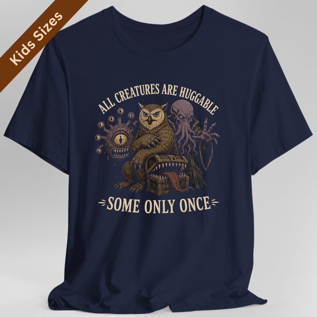 The same All Creatures Huggable design, on a navy kids t-shirt.