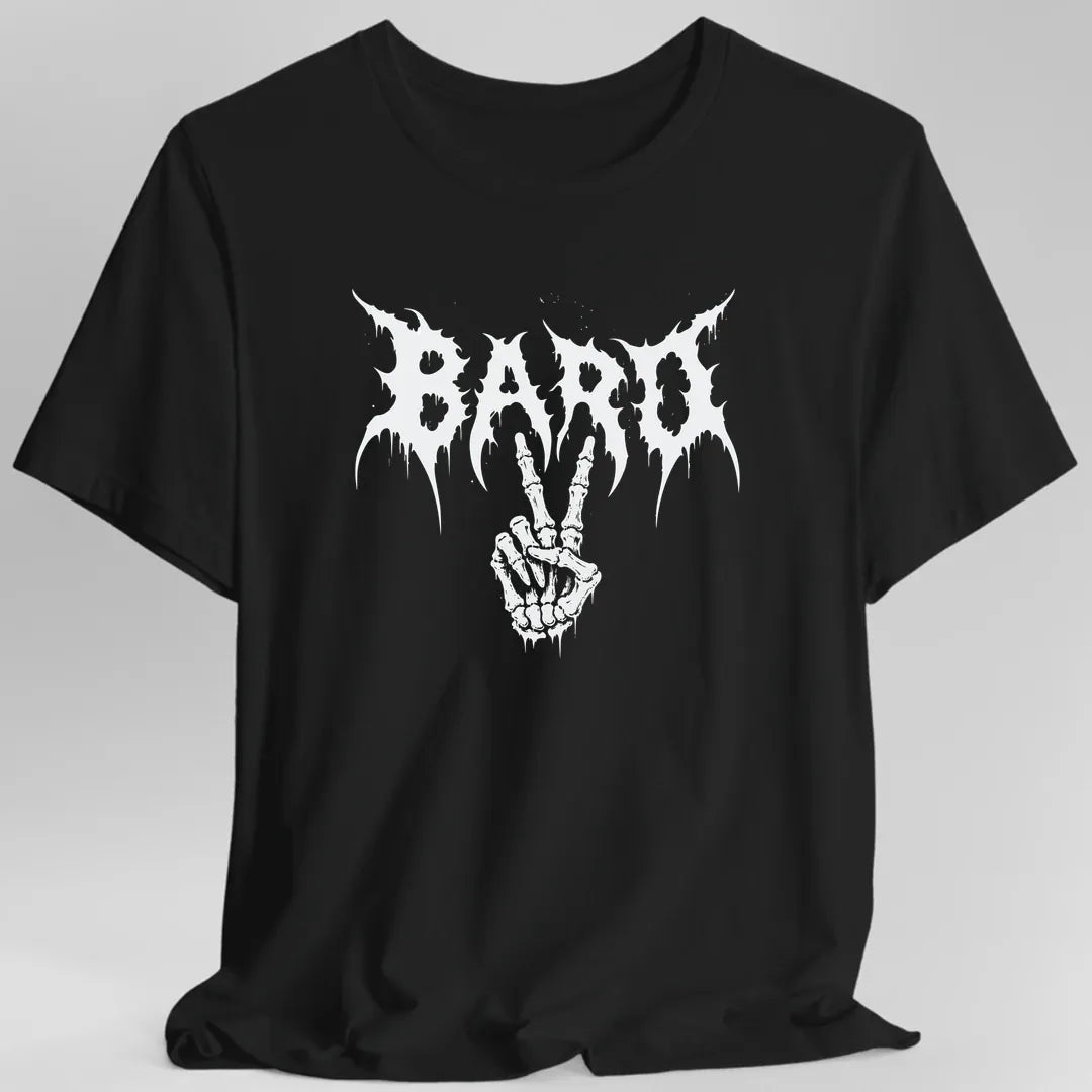 Black t-shirt. Reads "Bard" in jagged white heavy metal lettering, the kind used on black metal band logos, with spikes and drips running off every letter. A skeletal hand throws the rock horns beneath the word. All white on a plain background.