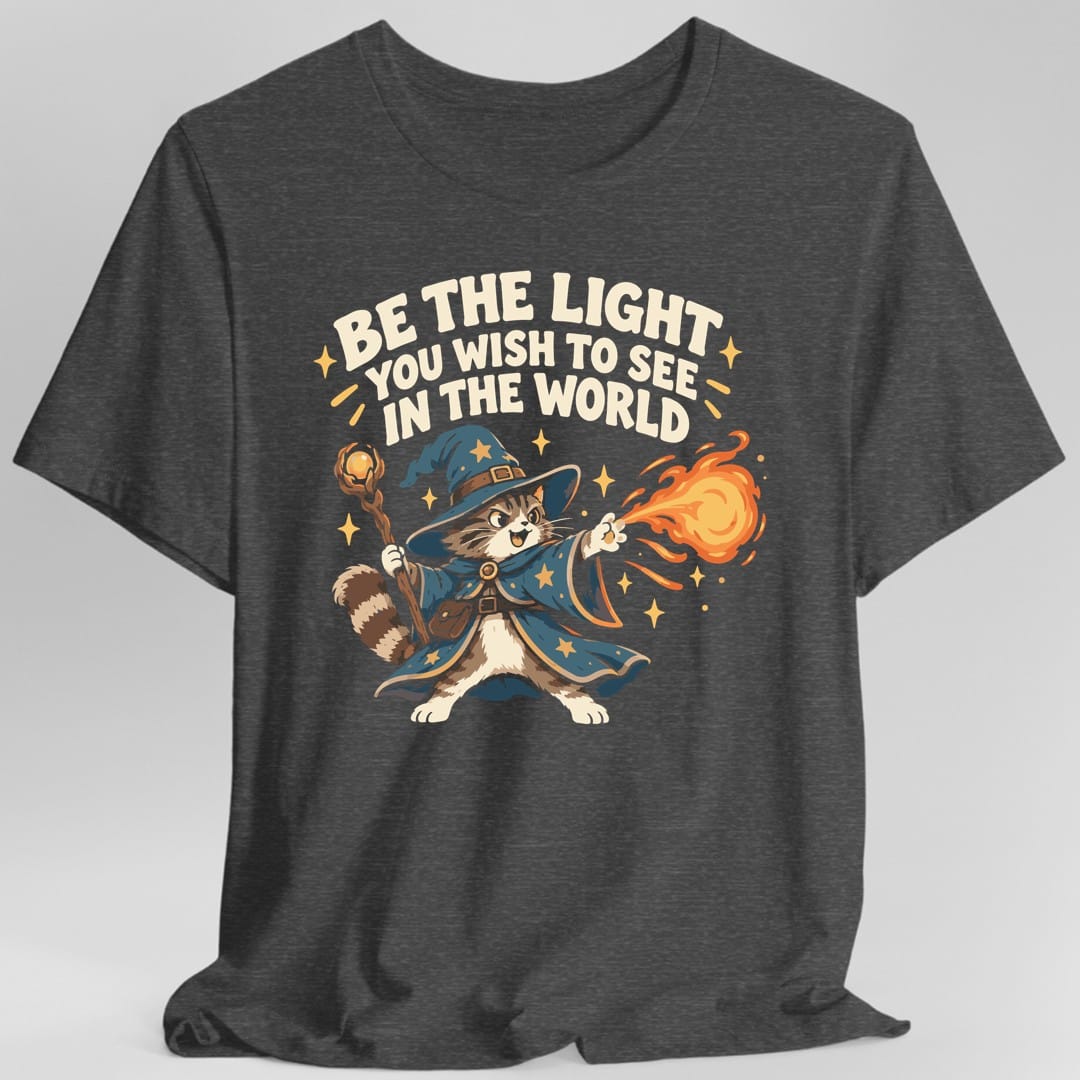 The same Be The Light wizard cat design, on a dark heather t-shirt.