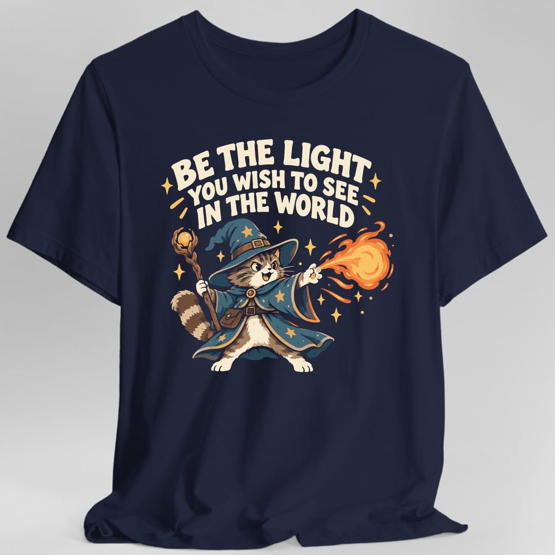 The same Be The Light wizard cat design, on a navy t-shirt.