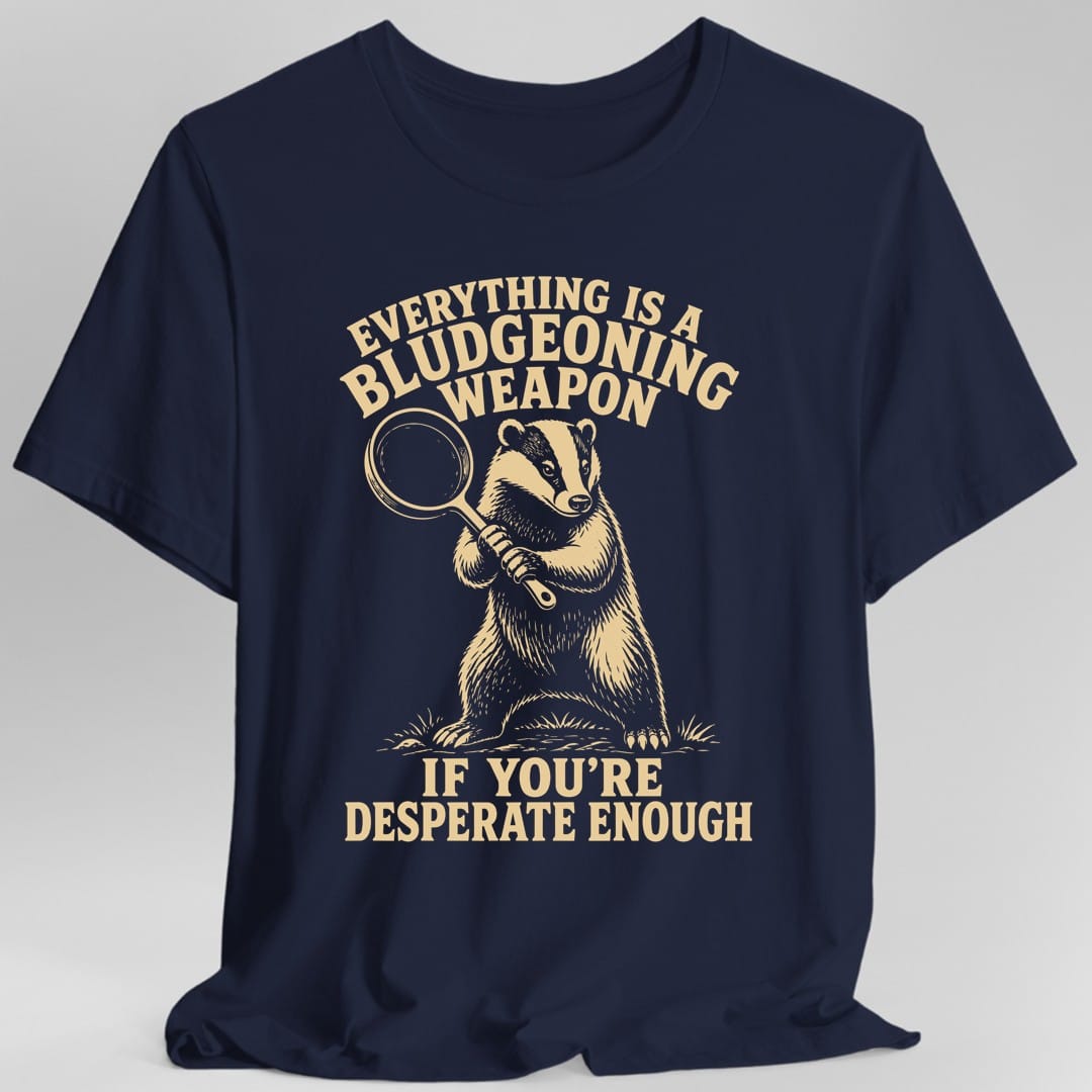 The same Bludgeoning Weapon badger design, on a navy t-shirt.