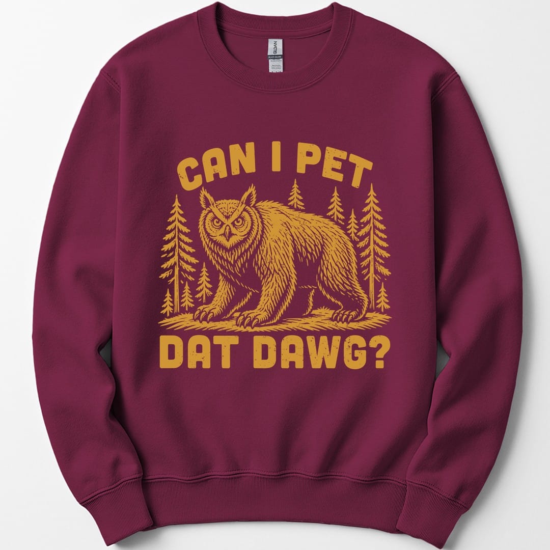 The same Can I Pet Dat Dawg owlbear design, on a maroon sweatshirt.