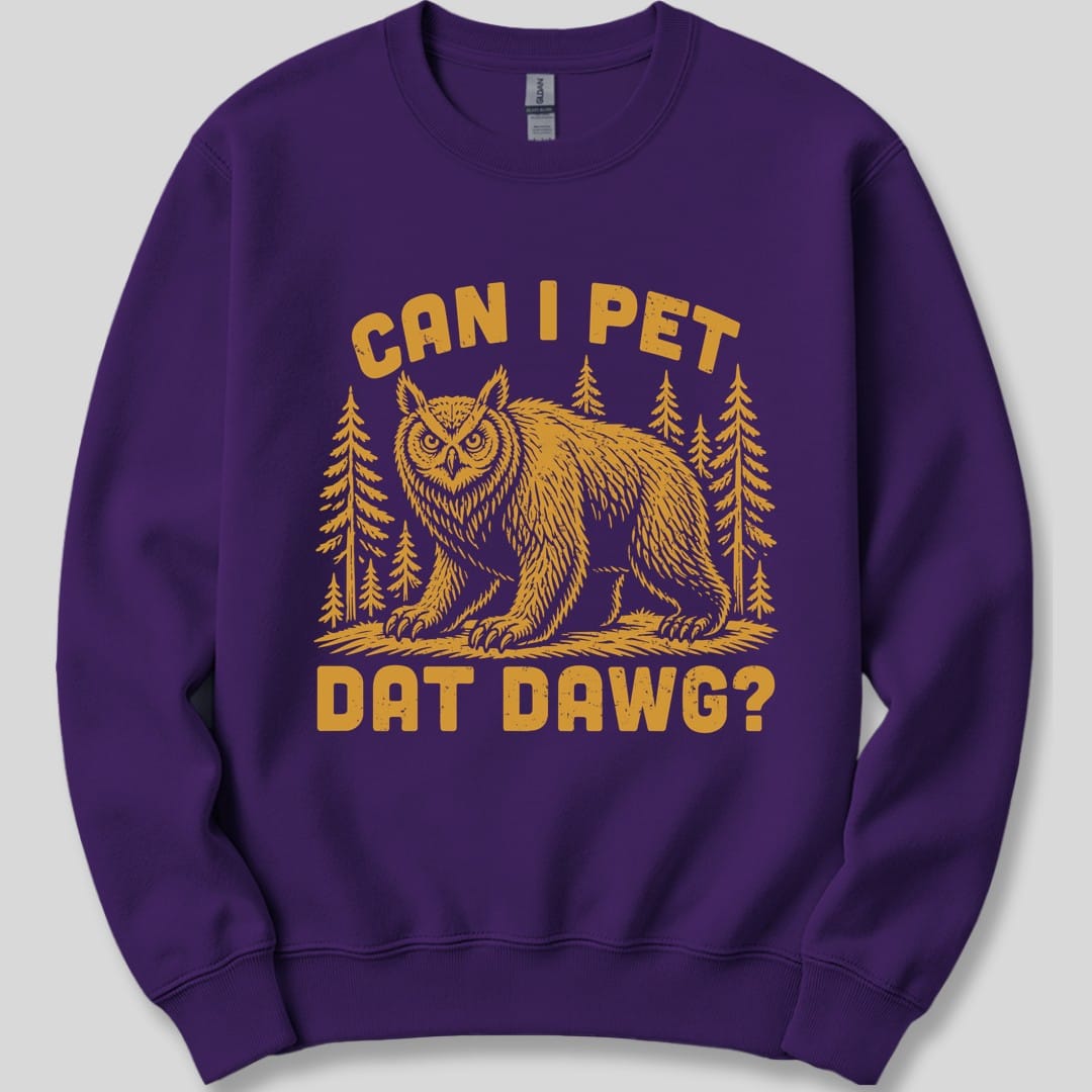The same Can I Pet Dat Dawg owlbear design, on a purple sweatshirt.