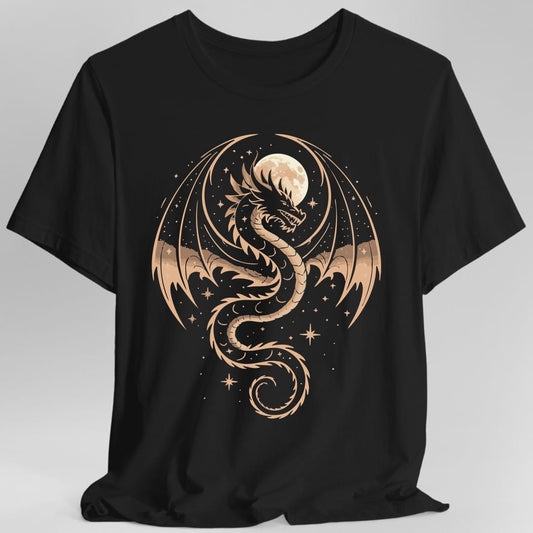 Black t-shirt. A long serpentine dragon coils in an S shape with its wings spread wide, its tail curling into a spiral at the bottom. A full moon sits behind its head, with small stars and sparkles scattered around. Fine line work in pale peach and cream. No words.