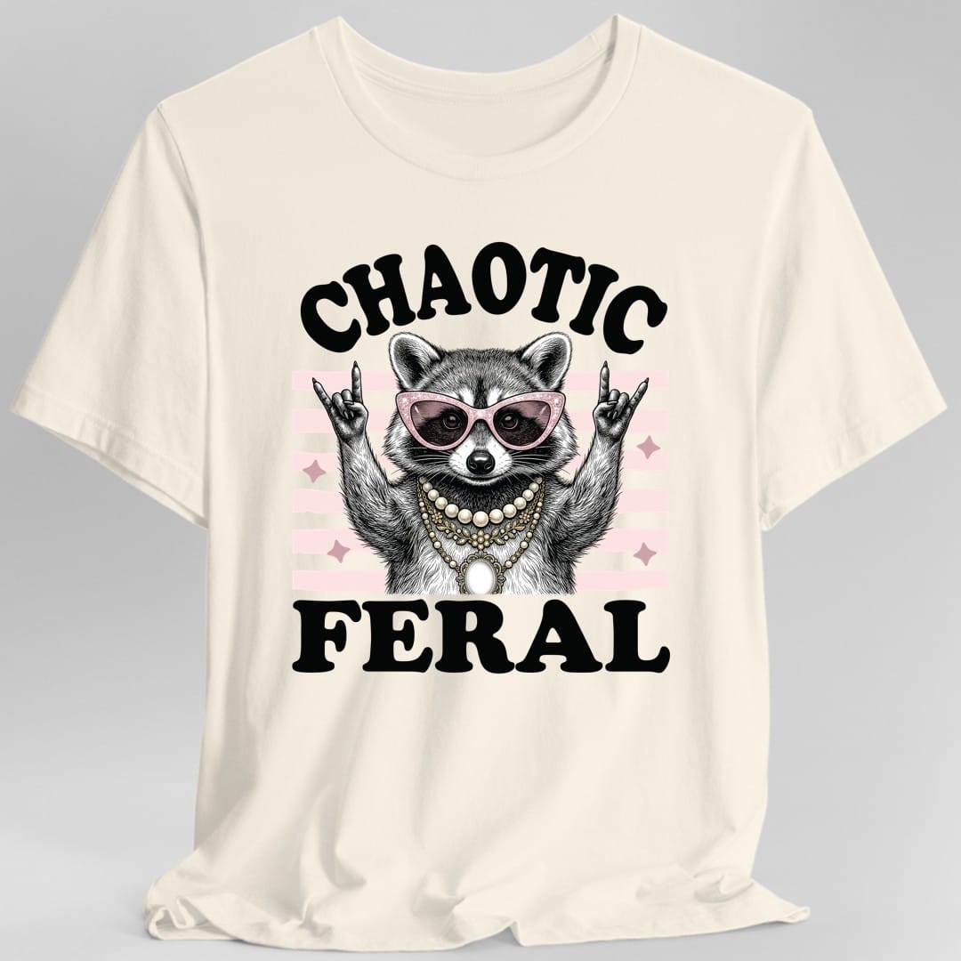 The same Chaotic Feral raccoon design, on a natural t-shirt.