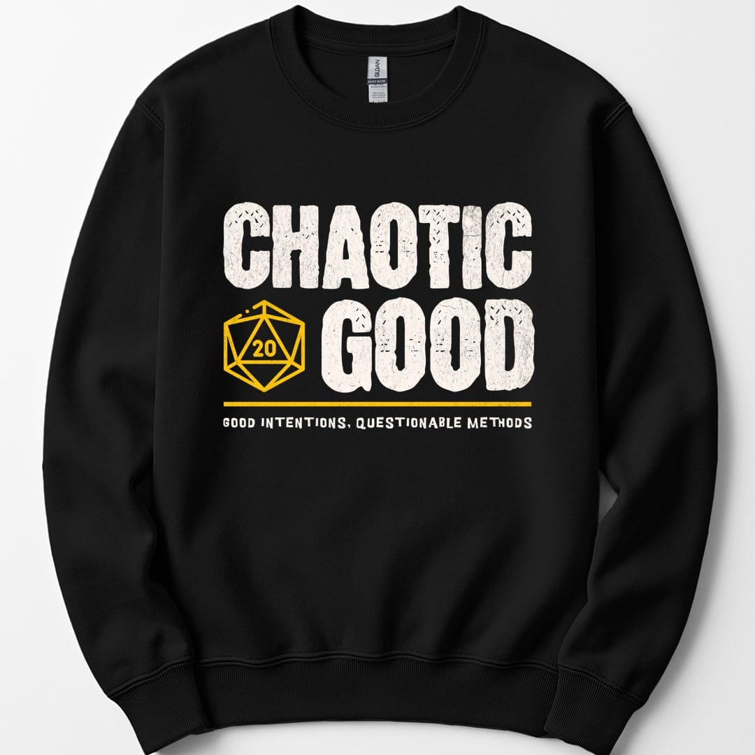 Black sweatshirt. Reads "Chaotic" then "Good" in tall rough cream capitals stacked over two lines, with a gold outlined twenty-sided die showing 20 tucked to the left of the word Good. A gold rule runs underneath, and below that a smaller cream line reads "Good intentions, questionable methods." All type, no illustration.