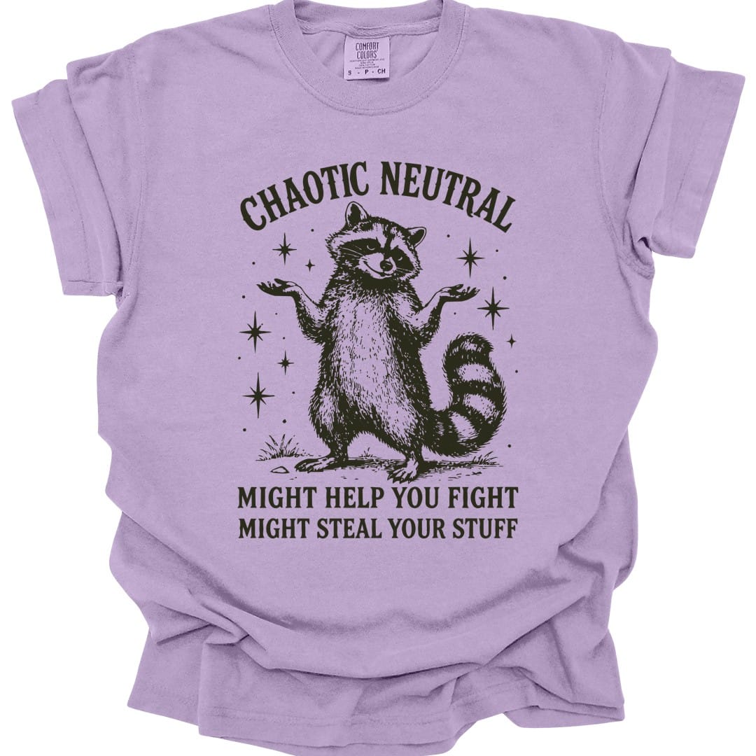 The same Chaotic Neutral raccoon design, on an orchid t-shirt.