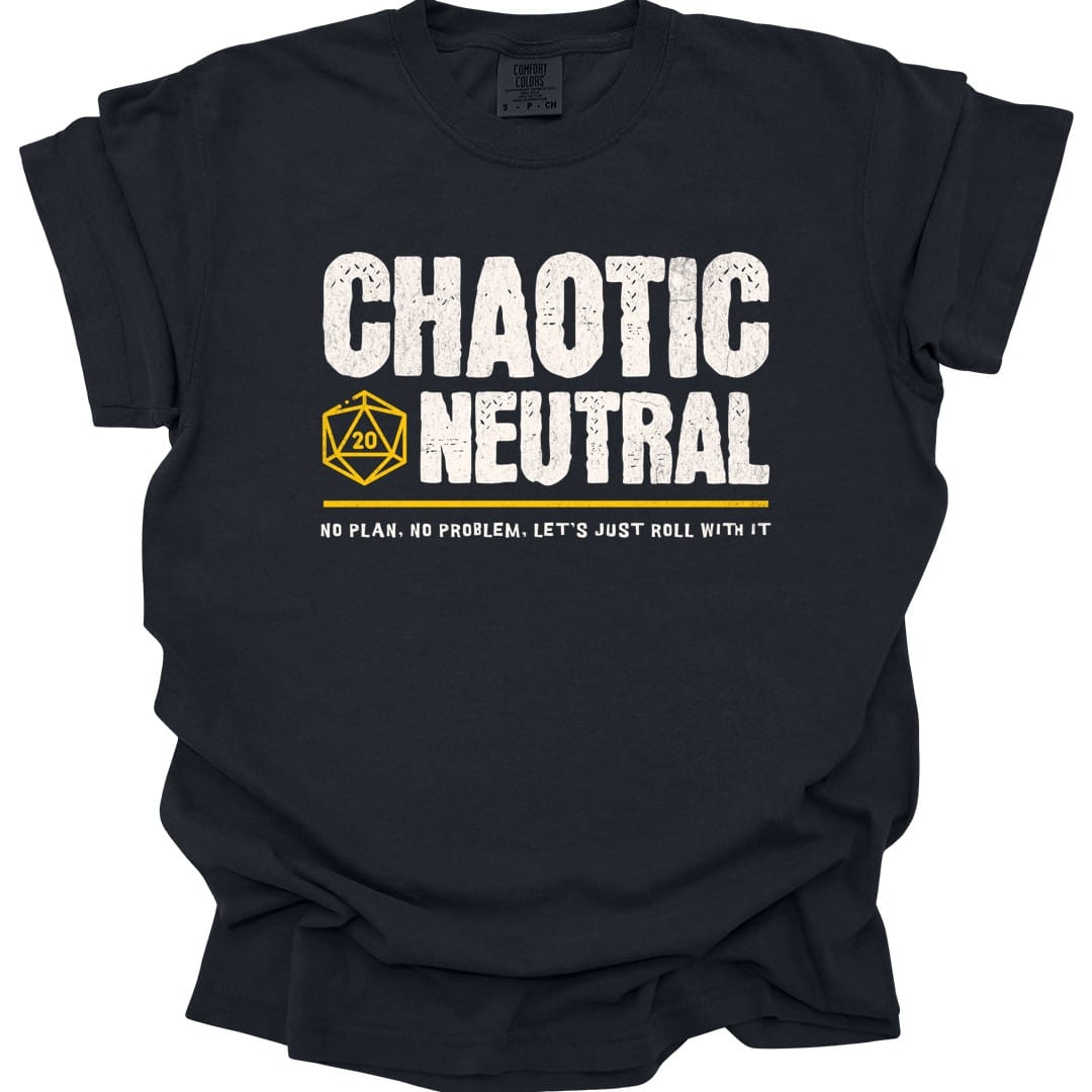 Black t-shirt. Reads "Chaotic" then "Neutral" in tall rough cream capitals stacked over two lines. A gold outlined twenty-sided die showing 20 is tucked to the left of the word "Neutral". A gold rule runs underneath, and below that a smaller cream line reads "No plan, no problem, let's just roll with it." All type, no illustration.