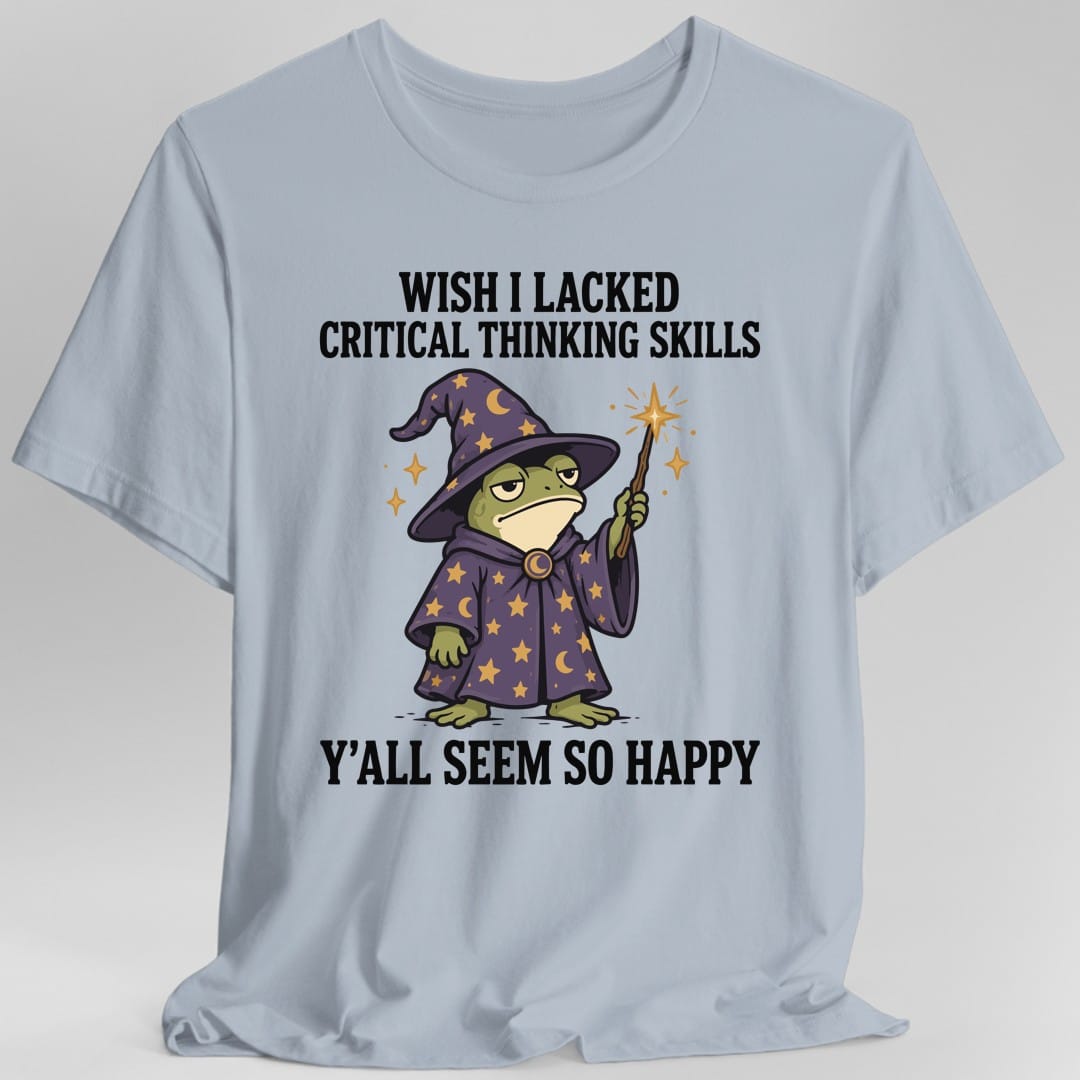 The same Critical thinking frog wizard design, on a light blue t-shirt.