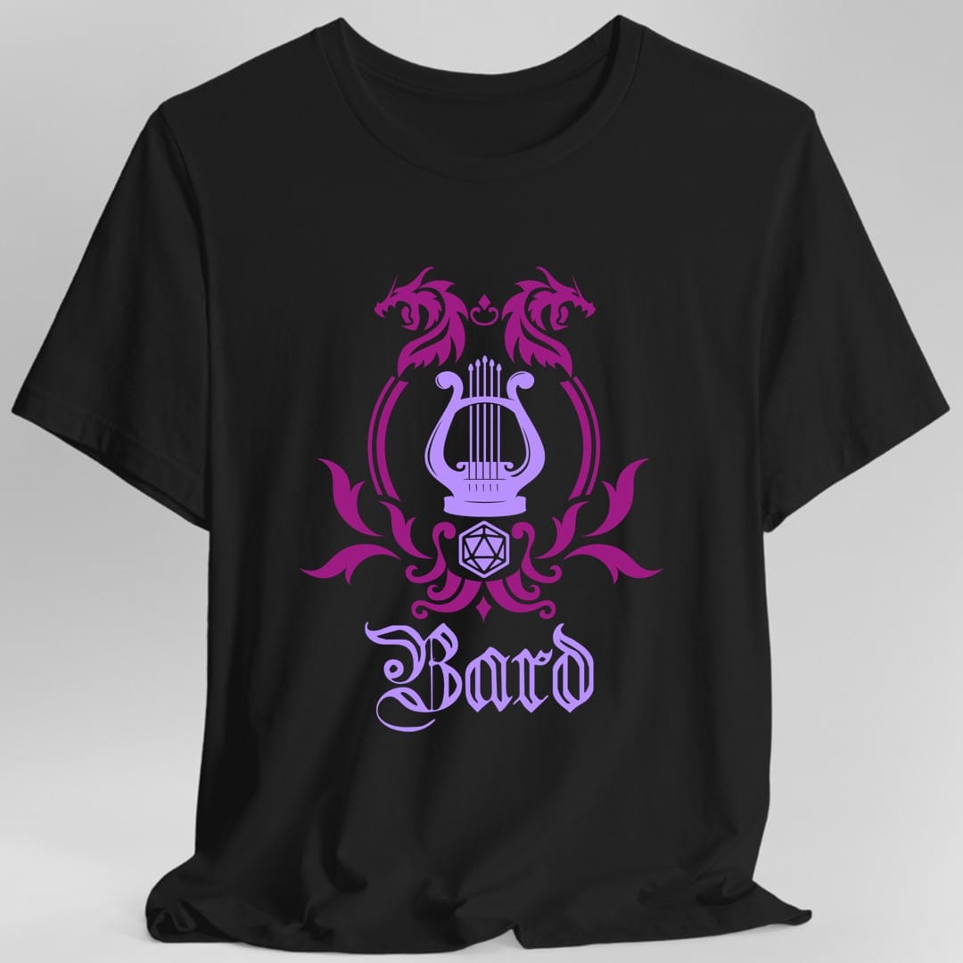 Black t-shirt. A heraldic crest drawn entirely in magenta and lilac on a plain background. Two dragons face each other over an arched frame, a lyre sits inside the arch, and a twenty-sided die hangs below it between leafy flourishes. Underneath, "Bard" in an ornate blackletter script.