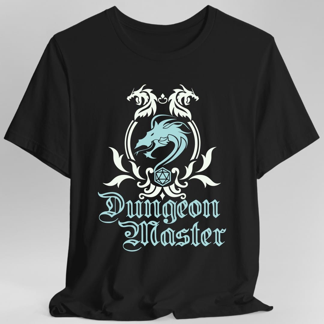 Black t-shirt. A heraldic crest drawn entirely in white with a pale blue dragon on a plain background. Two dragons face each other over an arched frame, a coiled dragon sits inside it, and a twenty-sided die hangs below between leafy flourishes. Underneath, "Dungeon Master" in an ornate blackletter script.