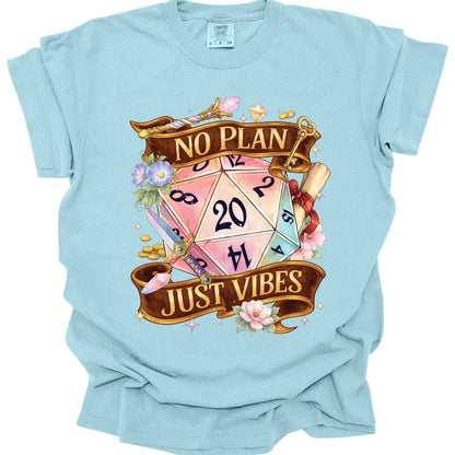 The same No Plan Just Vibes banner design, on a chambray t-shirt.