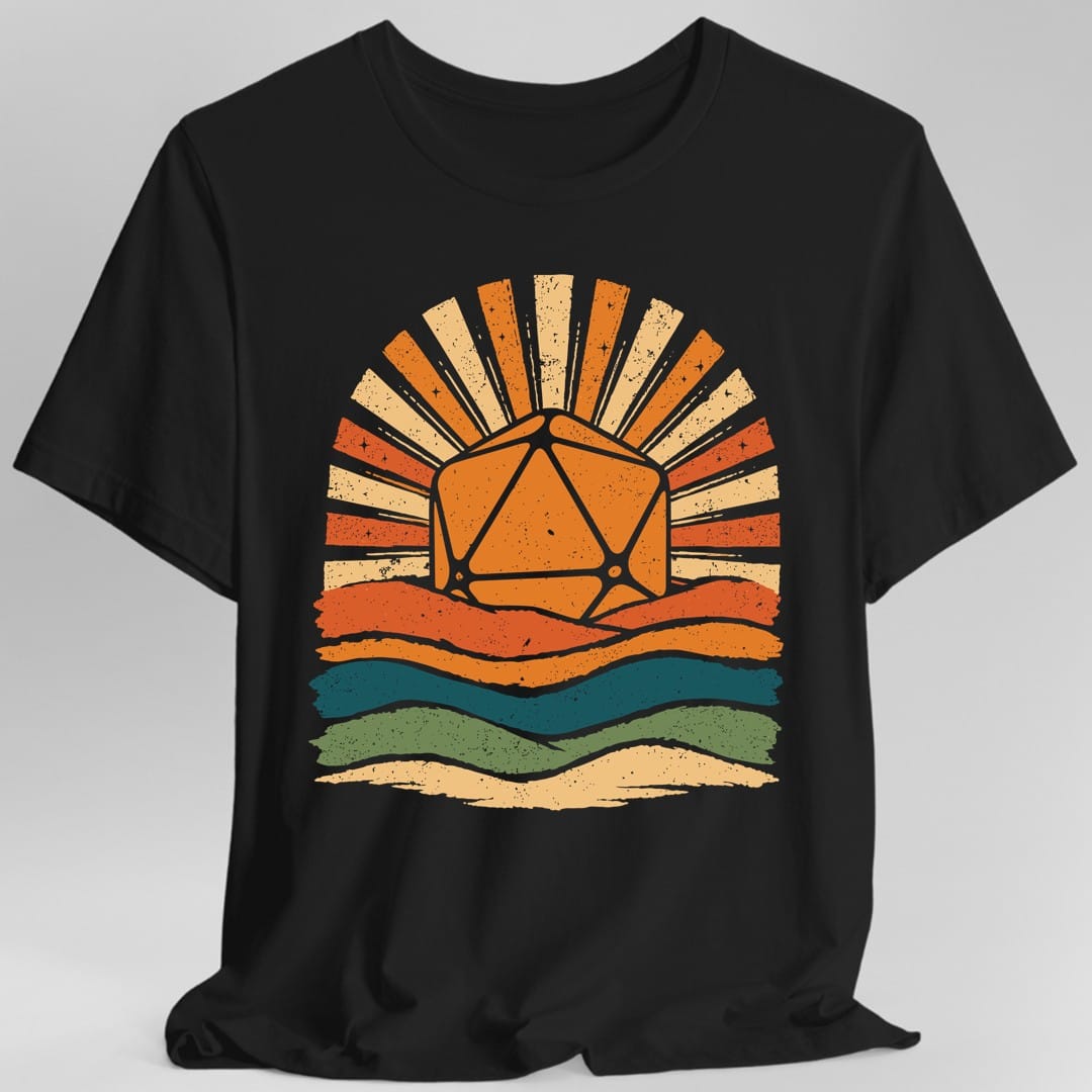 Black t-shirt. An orange twenty-sided die rises like a sun with long cream rays fanning out behind it. Below, wavy bands of orange, teal, green and cream stack up like hills and water. Distressed seventies texture throughout. No words.
