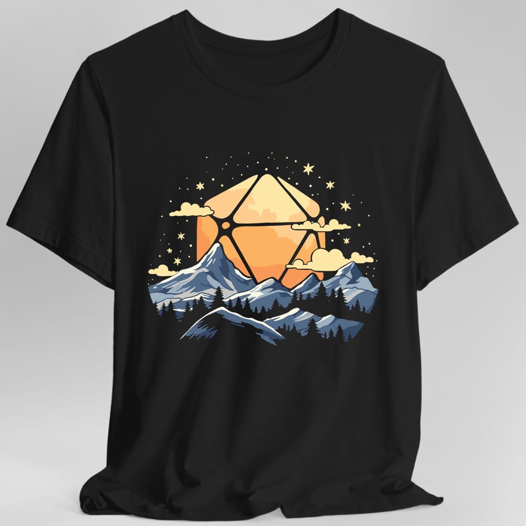 Black t-shirt. A large orange twenty-sided die hangs in the sky like a sun behind snow-capped blue mountains, with pine trees below, small clouds either side and stars scattered above. Soft flat illustration in orange, blue and cream. No words.