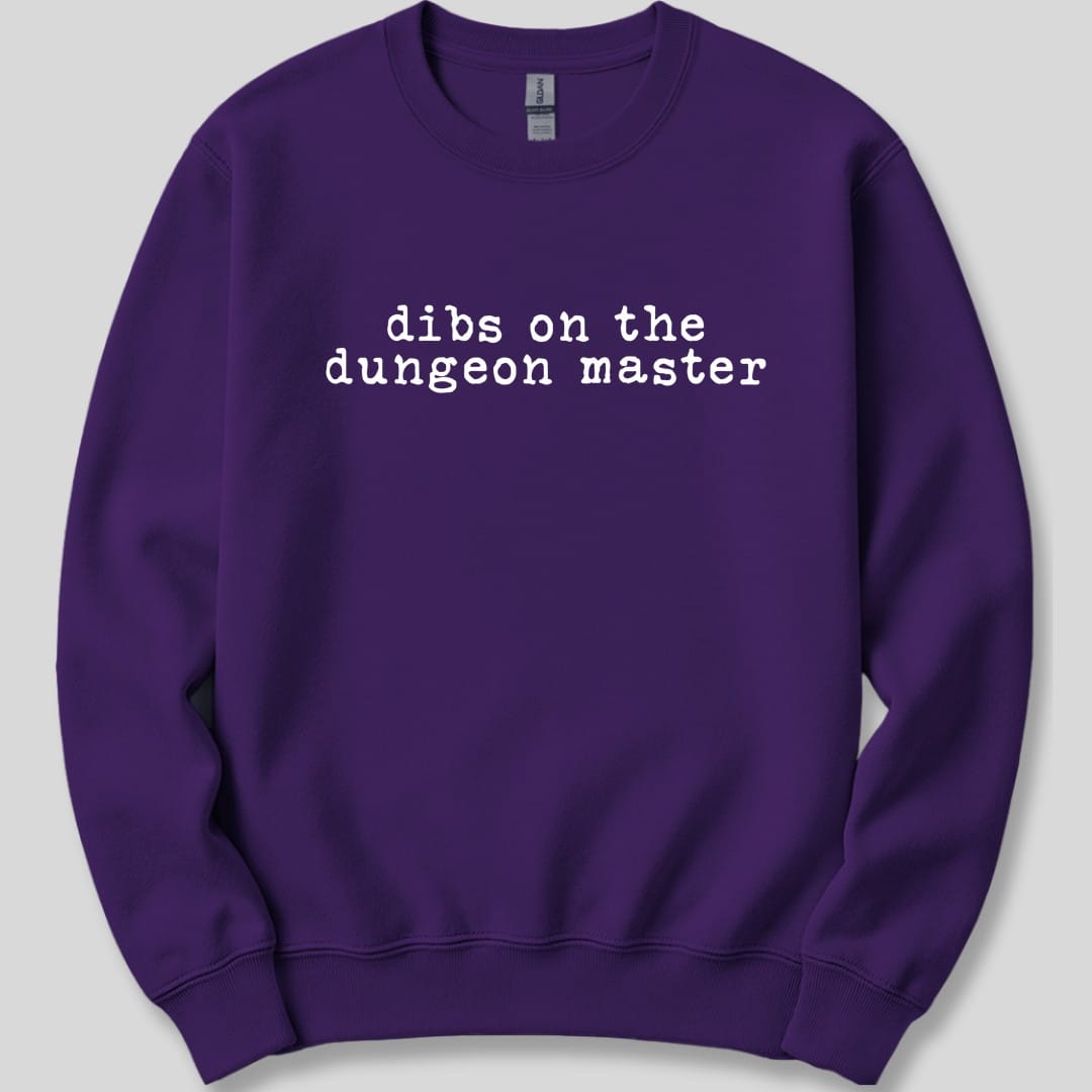 The same Dibs On The Dungeon Master design, on a purple sweatshirt.