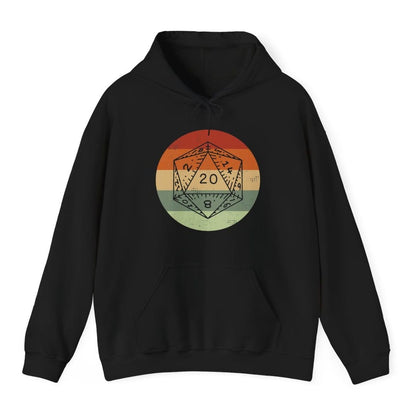 Black hoodie. A twenty-sided die drawn in thin outline and showing 20 sits over a circle striped like a retro sunset, in five broad horizontal bands, rust red at the top, then orange, cream, sage green and pale green at the bottom. Distressed vintage texture throughout. No words.