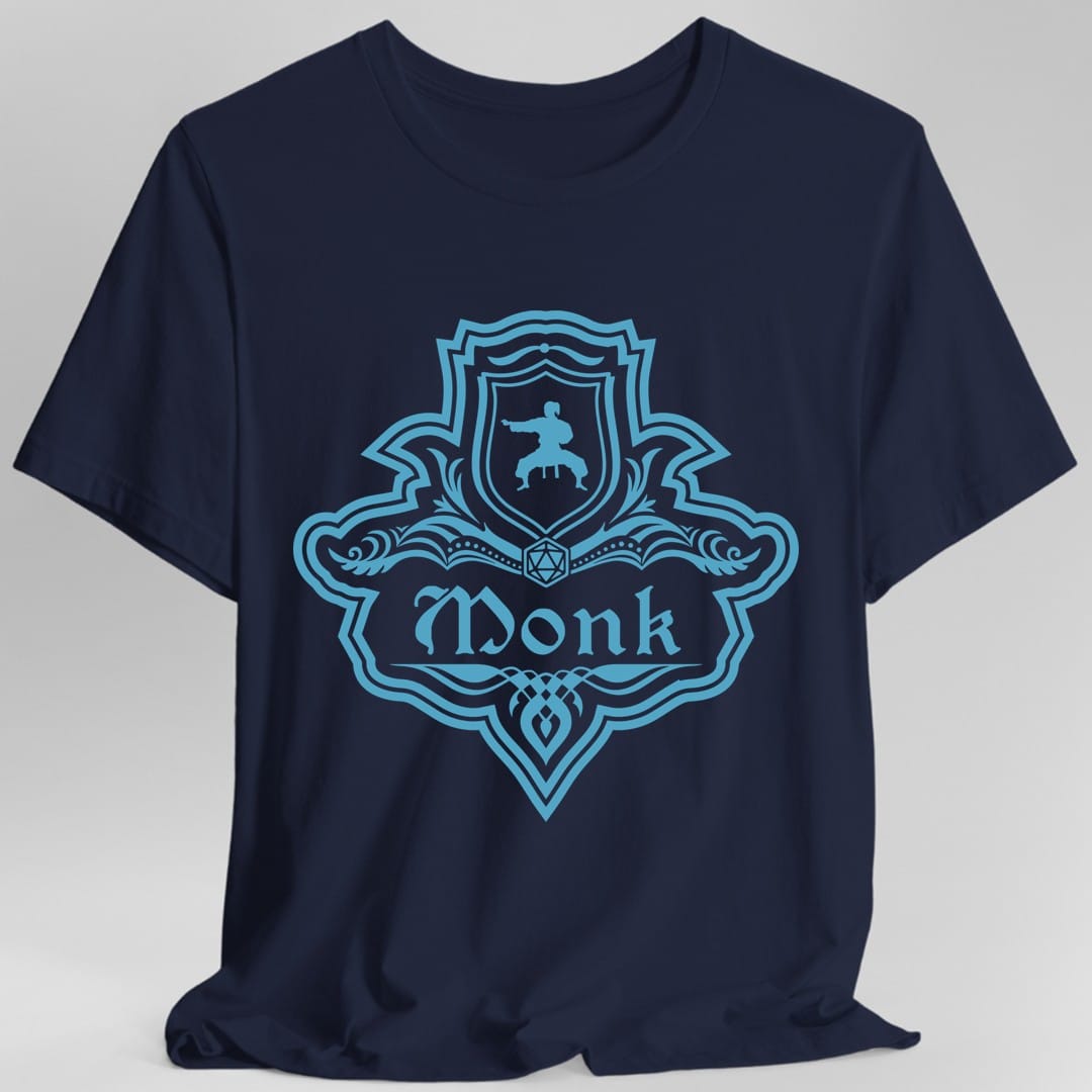 The same Monk one-color emblem design, on a navy t-shirt.