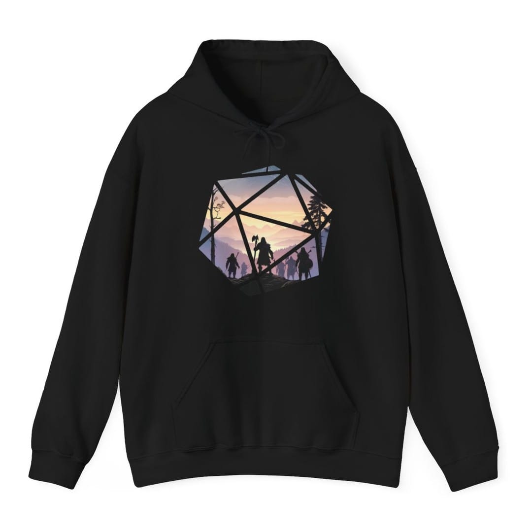 Black hoodie. A large twenty-sided die shape whose triangular facets act as windows onto one continuous landscape. Inside, a party of hooded adventurers in silhouette walks a rocky ridge toward misty violet mountains and a pale gold sunset, a bare tree on the left and pines on the right. The lead figure carries a tall axe. Soft flat illustration in lilac, dusty pink, cream and near black. No words.