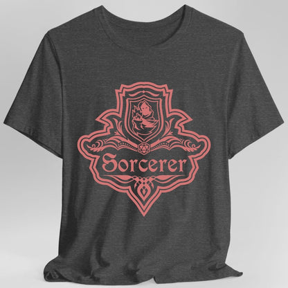 The same Sorcerer one-color emblem design, on a dark heather t-shirt.