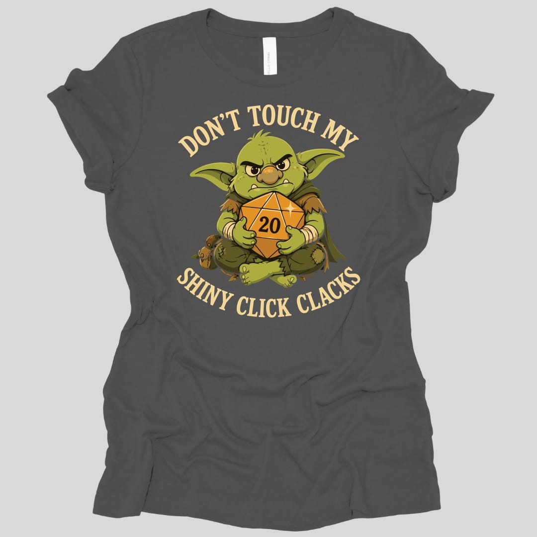 The same Don't Touch My Shiny Click Clacks design, on an asphalt women's t-shirt.