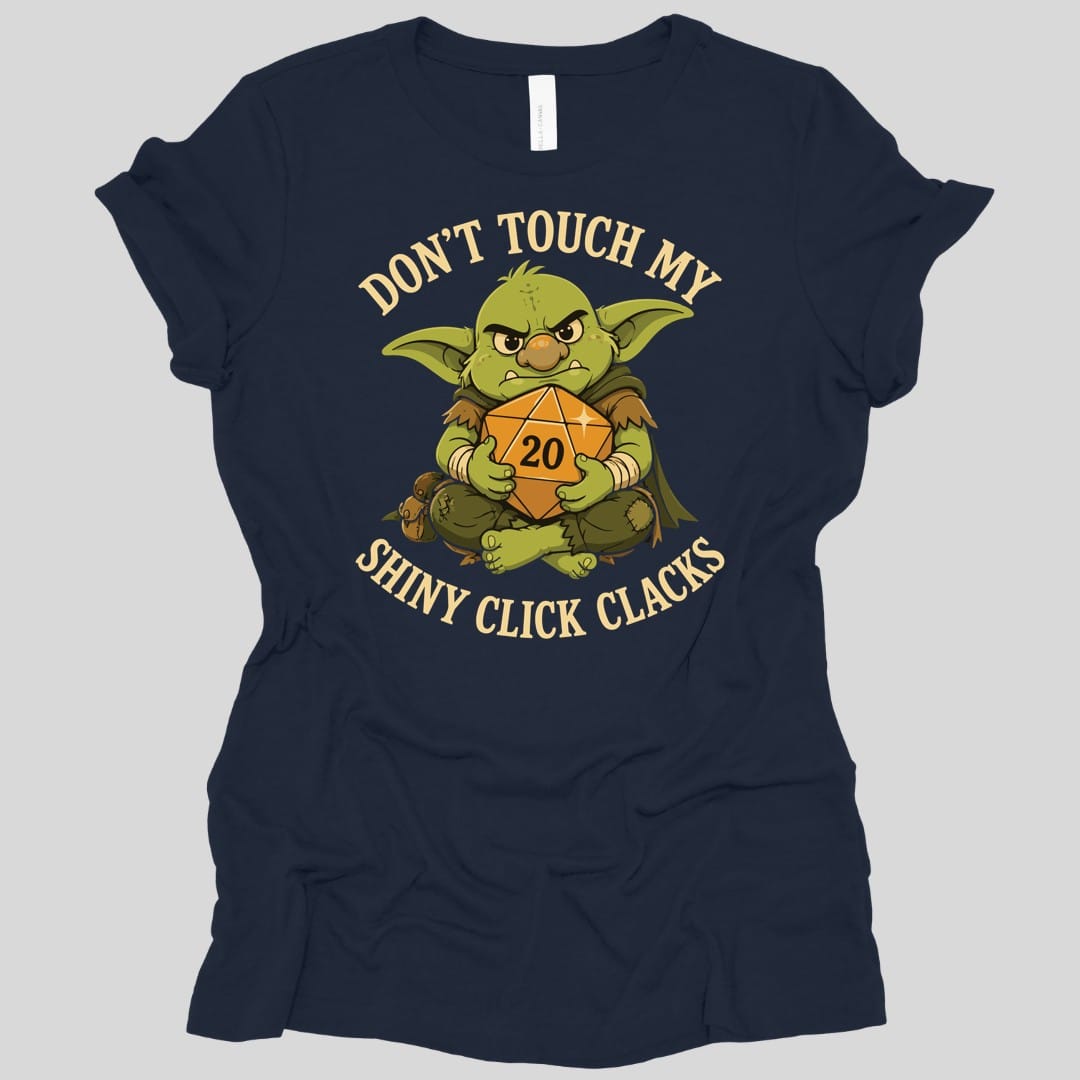 The same Don't Touch My Shiny Click Clacks design, on a navy women's t-shirt.