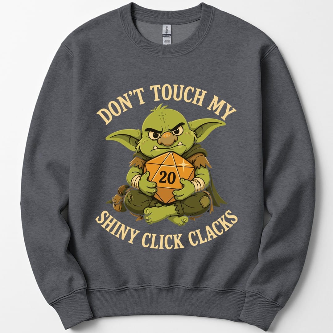 The same Don't Touch My Shiny Click Clacks design, on a dark heather sweatshirt.