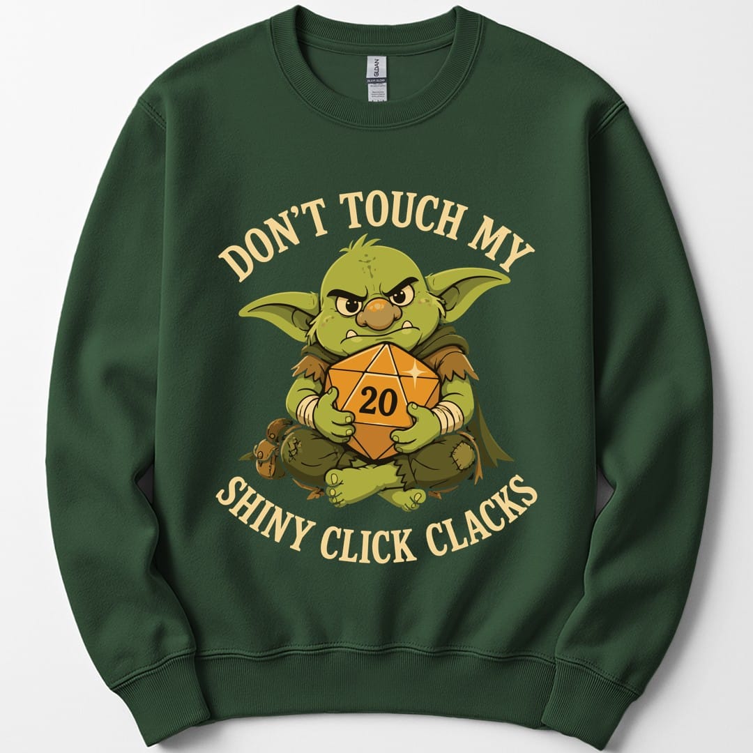 The same Don't Touch My Shiny Click Clacks design, on a forest green sweatshirt.