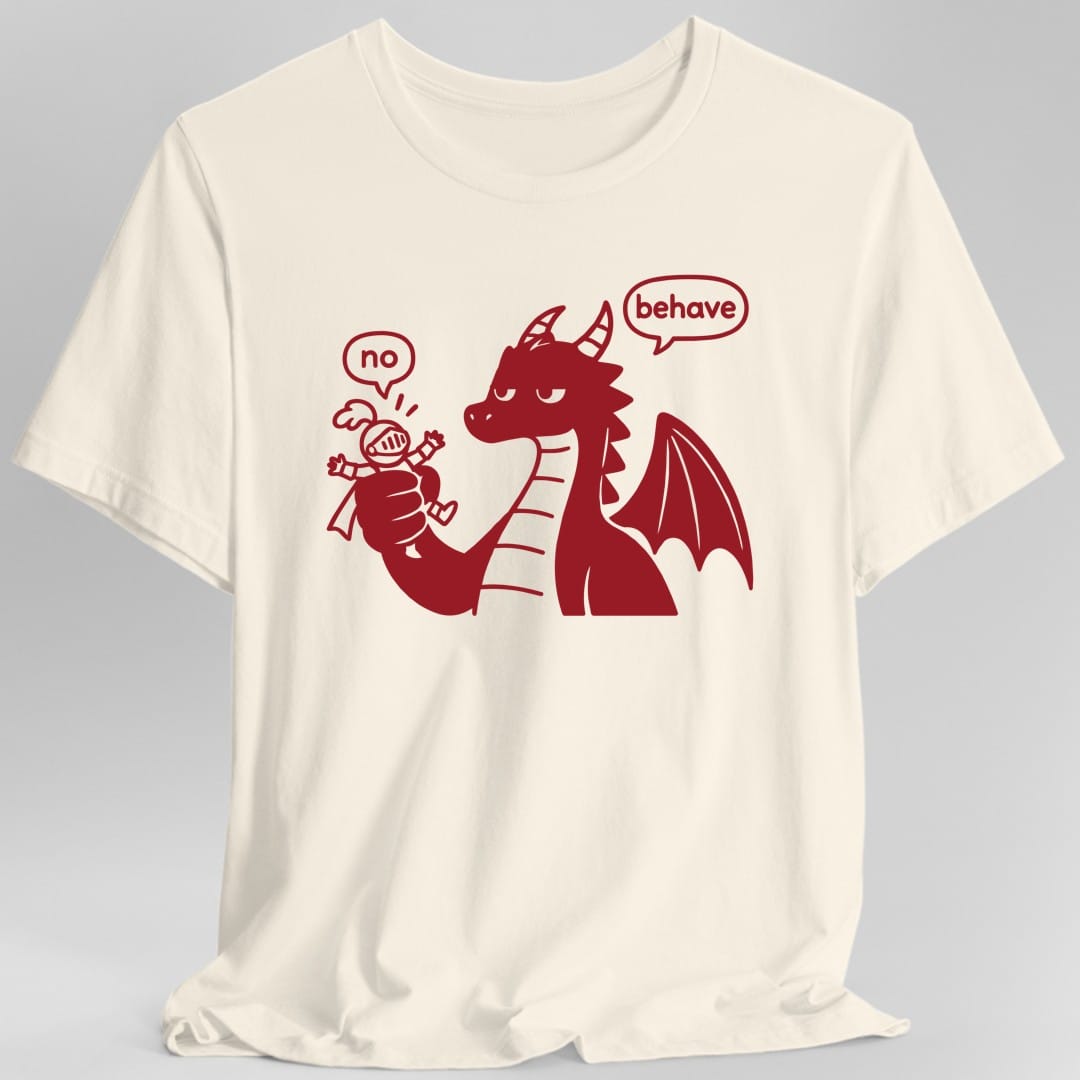 Natural t-shirt. A deep red line drawing of a large dragon with heavy lidded eyes, holding a tiny armored knight up in one fist. The knight waves its arms inside a speech bubble that reads "no", while the dragon's speech bubble reads "behave". Simple bold cartoon outlines in a single red ink.