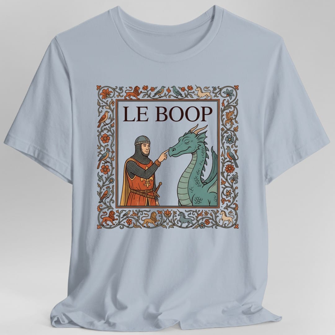 The same Le Boop dragon design, on a light blue t-shirt.