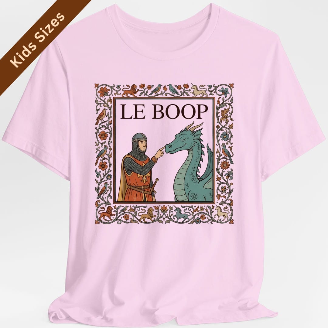 The same Le Boop dragon design, on a light pink kids t-shirt.