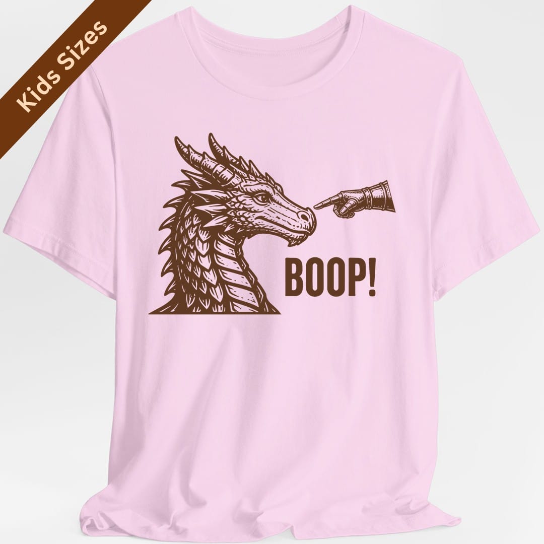 The same Dragon Boop design, on a light pink kids t-shirt.