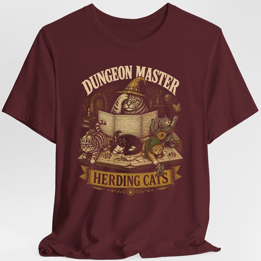 The same Dungeon Master Herding Cats design, on a maroon t-shirt.