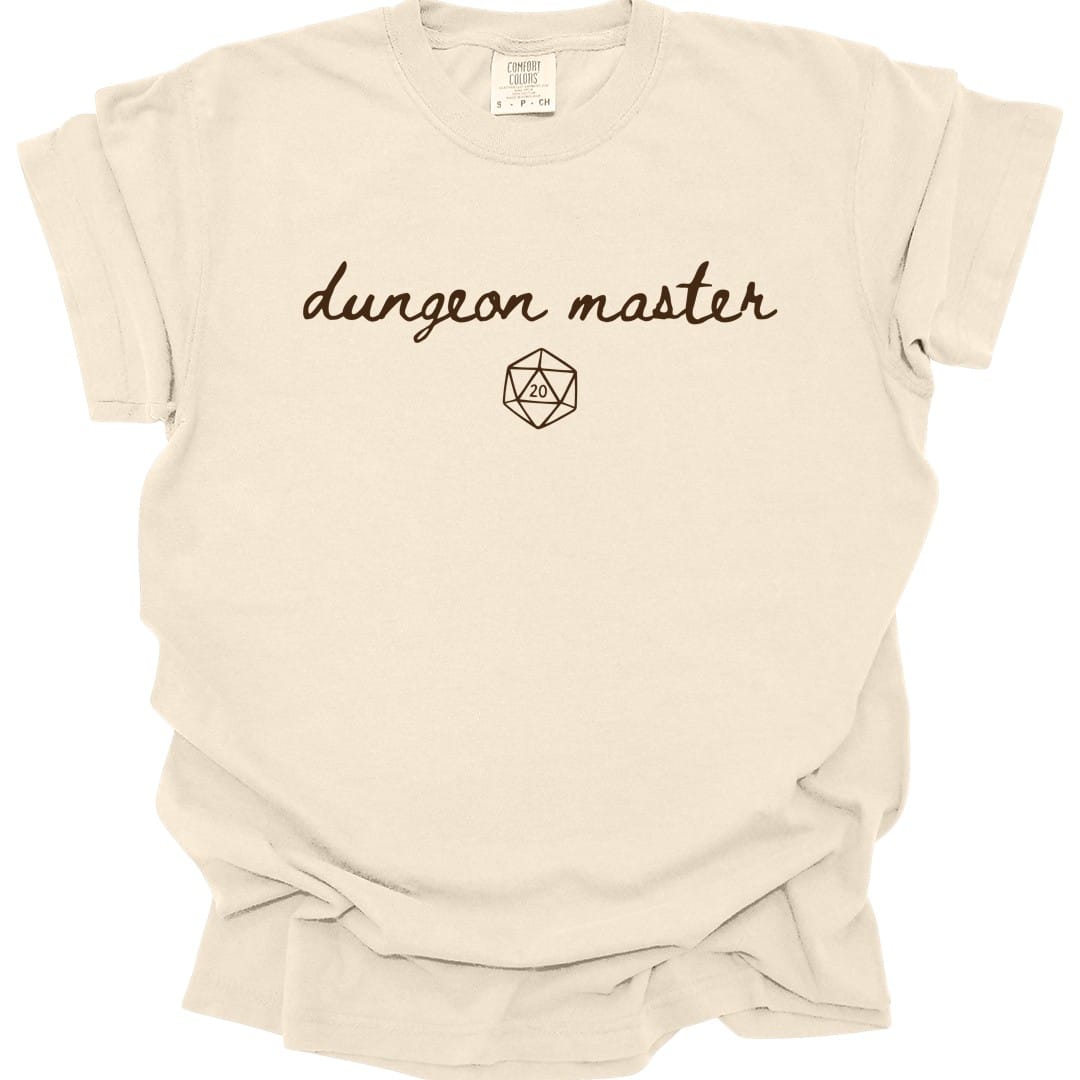 The same Dungeon Master handwritten design, on an ivory t-shirt.