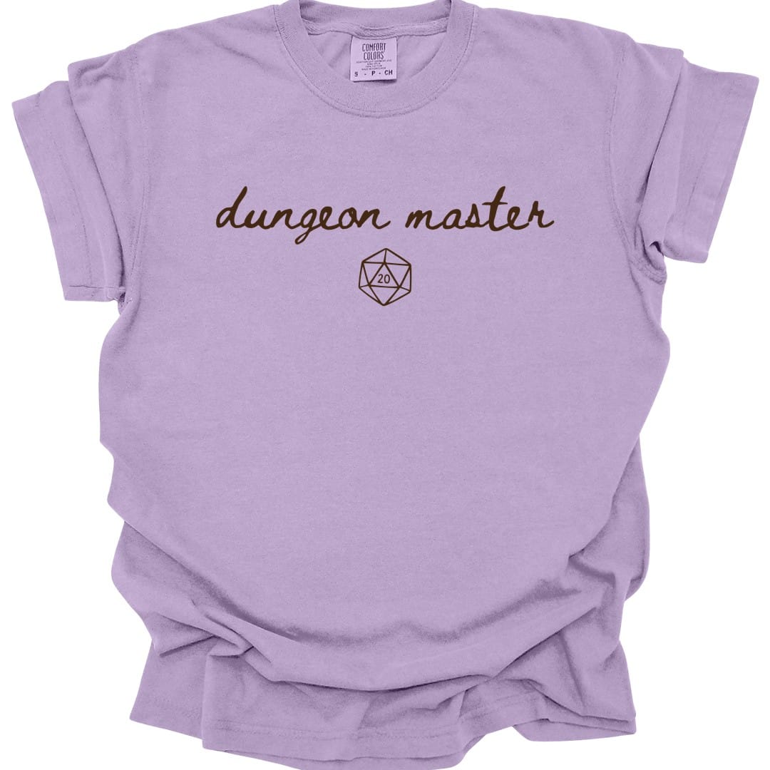 The same Dungeon Master handwritten design, on an orchid t-shirt.