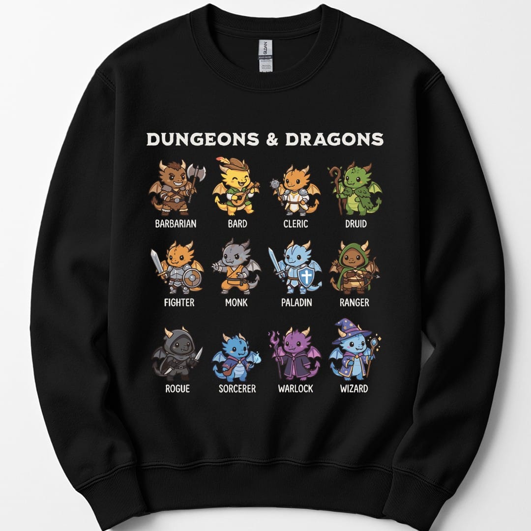 Black sweatshirt. Reads "Dungeons and Dragons" in chunky cream capitals across the top. Below, twelve small dragon-like characters stand in a grid, each dressed as a class and labelled underneath: barbarian, bard, cleric, druid, fighter, monk, paladin, ranger, rogue, sorcerer, warlock and wizard. Rounded cartoon style in browns, greens, blues and purples.