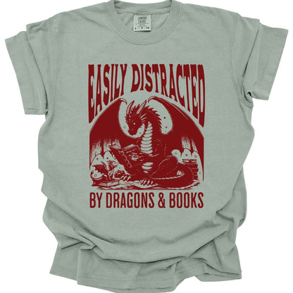 The same Easily Distracted by Dragons and Books design, on a bay t-shirt.
