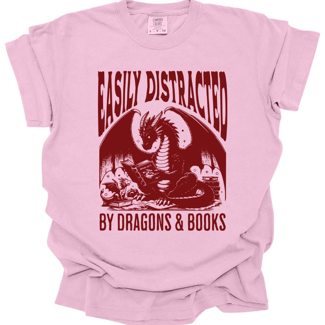 The same Easily Distracted by Dragons and Books design, on a blossom t-shirt.