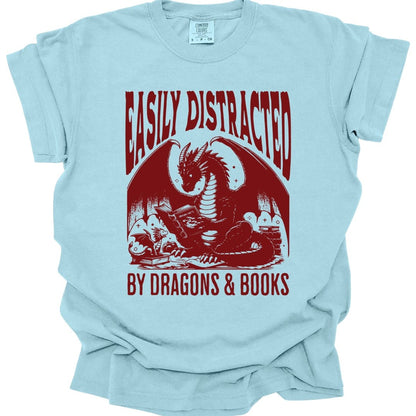 The same Easily Distracted by Dragons and Books design, on a chambray t-shirt.