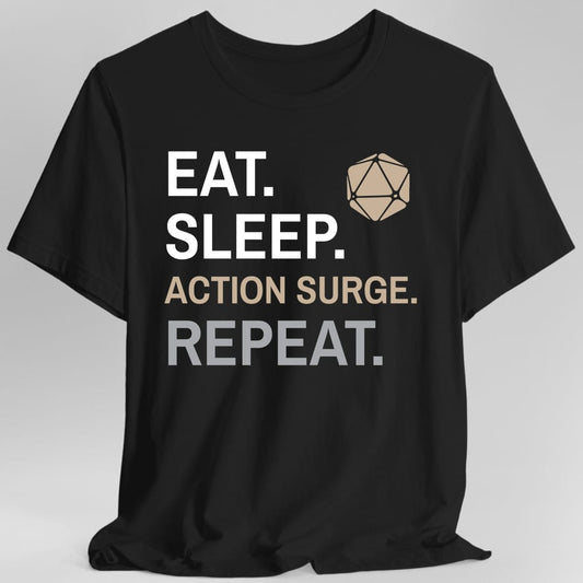 Black t-shirt. Four words stacked in heavy block capitals on four lines: "Eat." and "Sleep." in white, then "Action surge." in sand, then "Repeat." in grey. A sand twenty-sided die sits in the top right corner beside the word Eat. All type, no illustration.