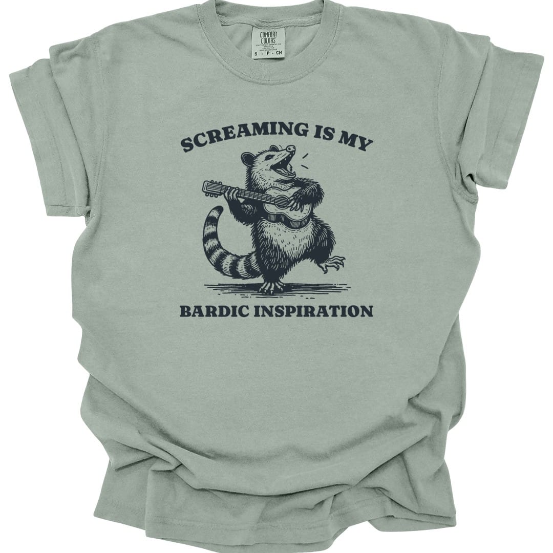 The same Bardic Inspiration possum design, on a bay t-shirt.