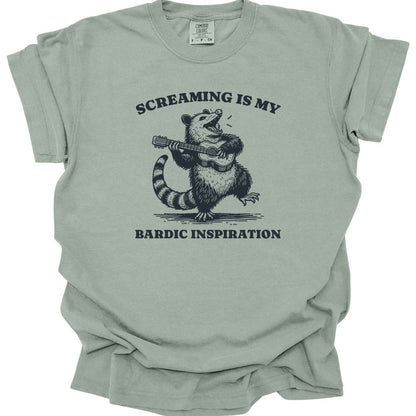 The same Bardic Inspiration possum design, on a bay t-shirt.