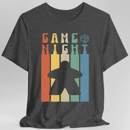 The same Game Night retro meeple design, on a dark heather t-shirt.