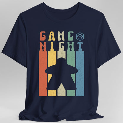 The same Game Night retro meeple design, on a navy t-shirt.