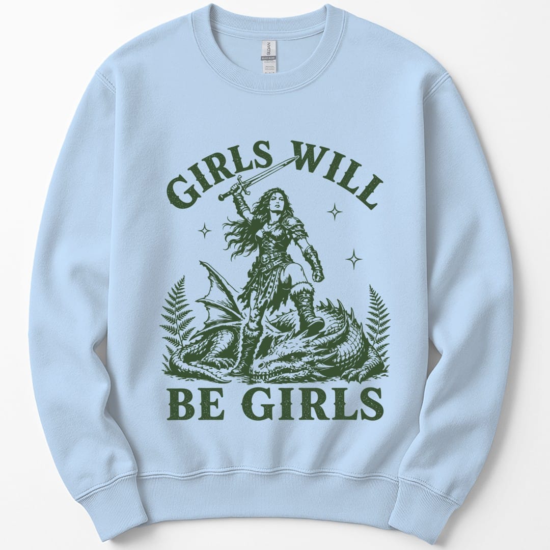 The same Girls Will Be Girls dragon slayer design, on a light blue sweatshirt.