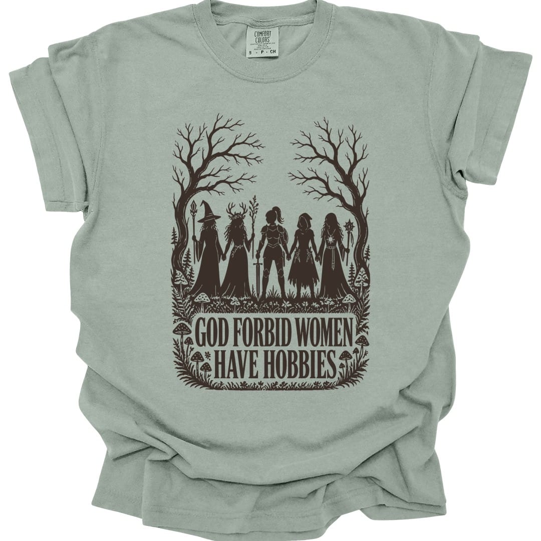 The same God Forbid Women Have Hobbies design, on a bay t-shirt.